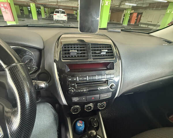 Белый Пежо 4008, объемом двигателя 2 л и пробегом 69 тыс. км за 12500 $, фото 9 на Automoto.ua