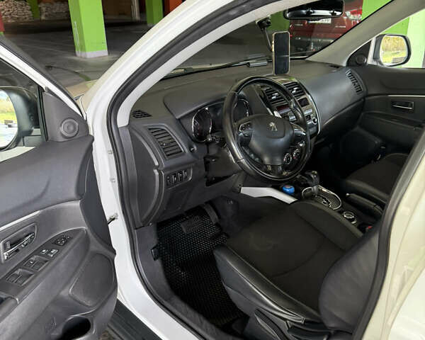 Белый Пежо 4008, объемом двигателя 2 л и пробегом 69 тыс. км за 12500 $, фото 11 на Automoto.ua