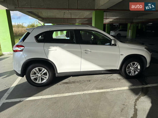 Белый Пежо 4008, объемом двигателя 2 л и пробегом 69 тыс. км за 12500 $, фото 6 на Automoto.ua