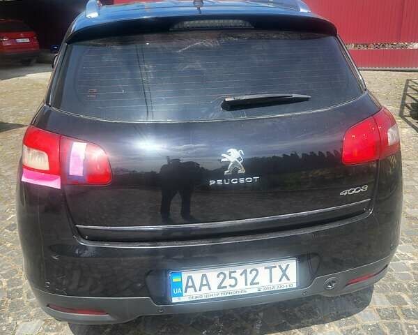 Черный Пежо 4008, объемом двигателя 2 л и пробегом 184 тыс. км за 10800 $, фото 2 на Automoto.ua