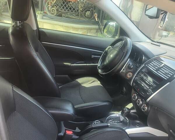 Черный Пежо 4008, объемом двигателя 2 л и пробегом 184 тыс. км за 10800 $, фото 12 на Automoto.ua