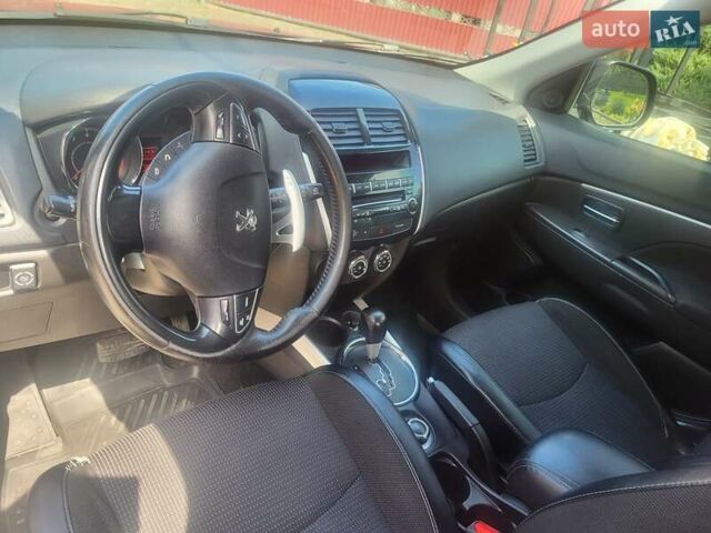 Черный Пежо 4008, объемом двигателя 2 л и пробегом 184 тыс. км за 10800 $, фото 3 на Automoto.ua