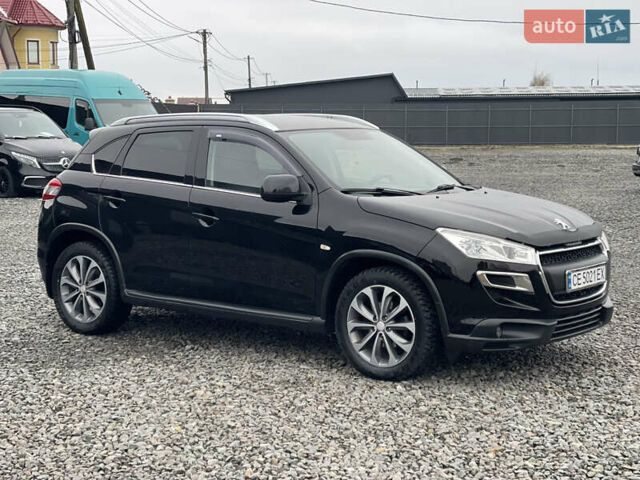 Черный Пежо 4008, объемом двигателя 2 л и пробегом 205 тыс. км за 11950 $, фото 5 на Automoto.ua