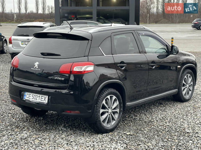 Черный Пежо 4008, объемом двигателя 2 л и пробегом 205 тыс. км за 11950 $, фото 8 на Automoto.ua