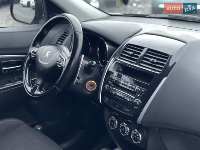 Черный Пежо 4008, объемом двигателя 2 л и пробегом 205 тыс. км за 11950 $, фото 20 на Automoto.ua