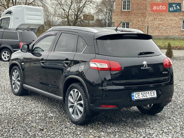 Черный Пежо 4008, объемом двигателя 2 л и пробегом 205 тыс. км за 11950 $, фото 11 на Automoto.ua