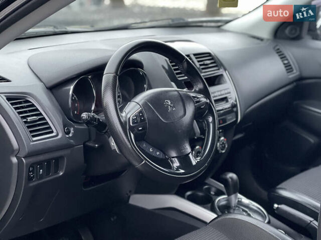 Черный Пежо 4008, объемом двигателя 2 л и пробегом 205 тыс. км за 11950 $, фото 18 на Automoto.ua