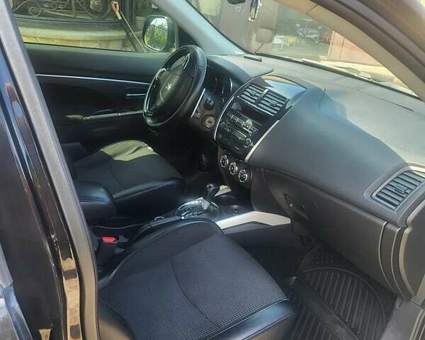 Черный Пежо 4008, объемом двигателя 2 л и пробегом 184 тыс. км за 10800 $, фото 13 на Automoto.ua