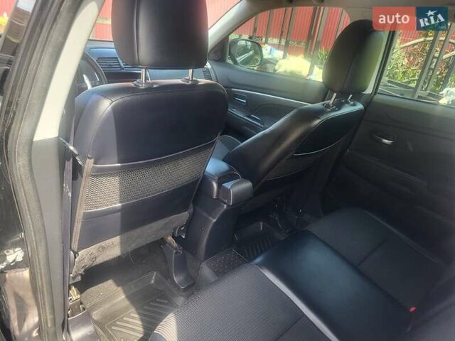 Черный Пежо 4008, объемом двигателя 2 л и пробегом 184 тыс. км за 10800 $, фото 9 на Automoto.ua