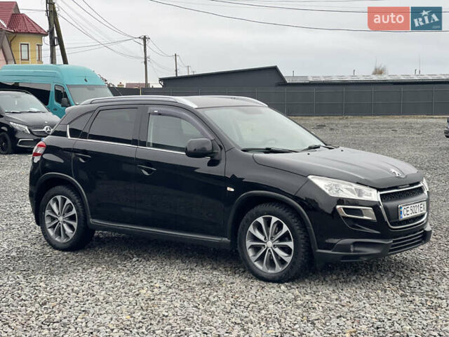 Черный Пежо 4008, объемом двигателя 2 л и пробегом 205 тыс. км за 11950 $, фото 4 на Automoto.ua