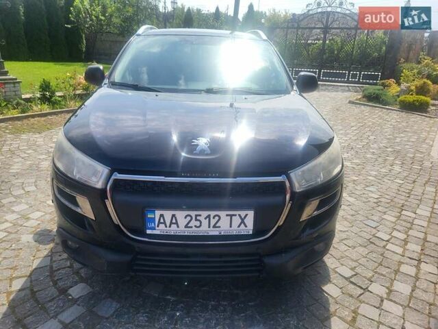 Черный Пежо 4008, объемом двигателя 2 л и пробегом 184 тыс. км за 10800 $, фото 1 на Automoto.ua