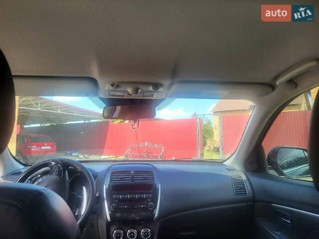 Черный Пежо 4008, объемом двигателя 2 л и пробегом 184 тыс. км за 10800 $, фото 10 на Automoto.ua