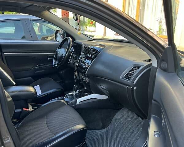 Коричневый Пежо 4008, объемом двигателя 2 л и пробегом 203 тыс. км за 10900 $, фото 15 на Automoto.ua