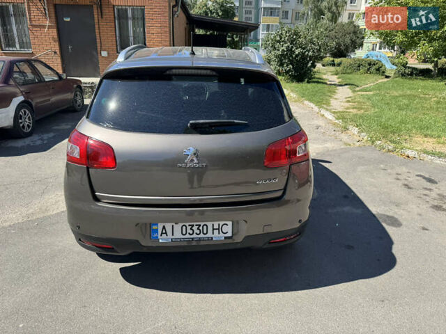 Коричневый Пежо 4008, объемом двигателя 2 л и пробегом 160 тыс. км за 12500 $, фото 10 на Automoto.ua