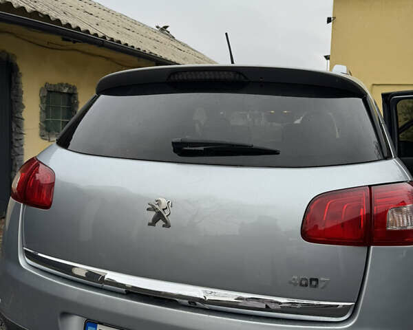 Серый Пежо 4008, объемом двигателя 1.56 л и пробегом 270 тыс. км за 11000 $, фото 11 на Automoto.ua