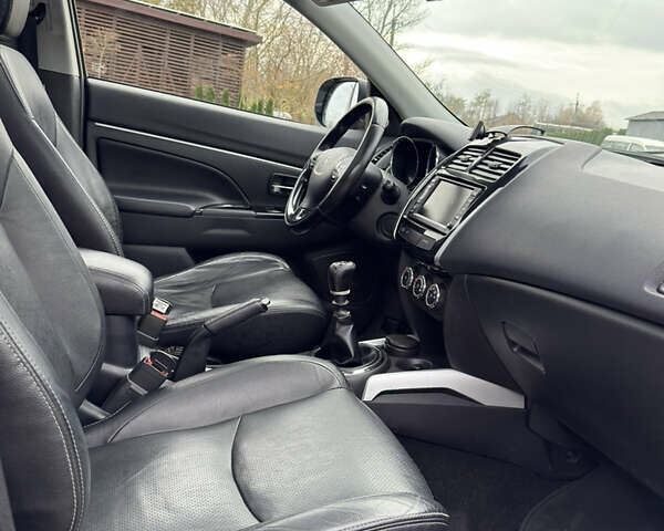 Серый Пежо 4008, объемом двигателя 1.8 л и пробегом 155 тыс. км за 12700 $, фото 20 на Automoto.ua