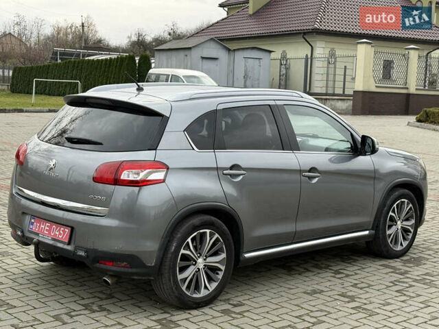 Серый Пежо 4008, объемом двигателя 1.8 л и пробегом 155 тыс. км за 12700 $, фото 7 на Automoto.ua