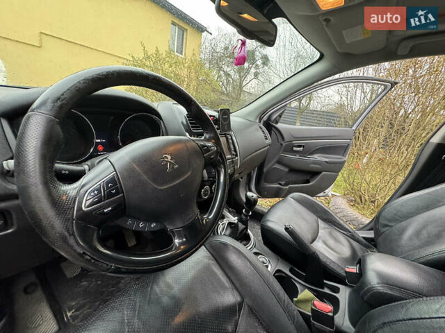 Серый Пежо 4008, объемом двигателя 1.56 л и пробегом 270 тыс. км за 11000 $, фото 4 на Automoto.ua