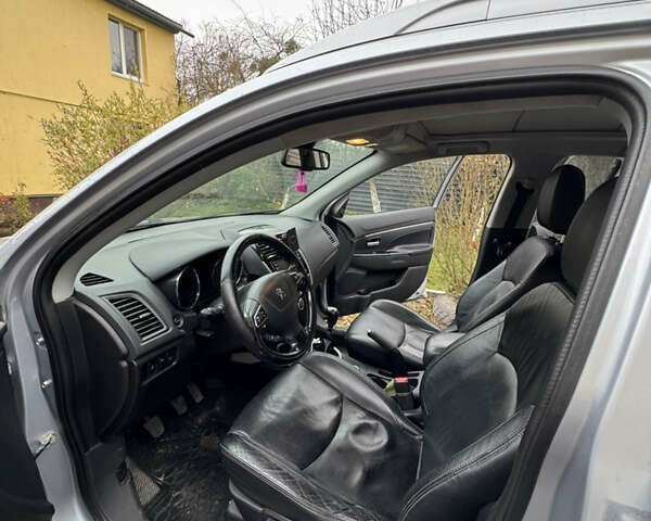 Серый Пежо 4008, объемом двигателя 1.56 л и пробегом 270 тыс. км за 11000 $, фото 7 на Automoto.ua