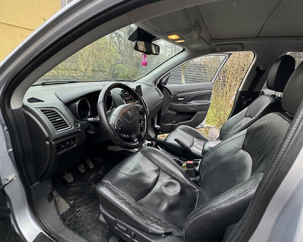 Серый Пежо 4008, объемом двигателя 1.56 л и пробегом 270 тыс. км за 11000 $, фото 8 на Automoto.ua