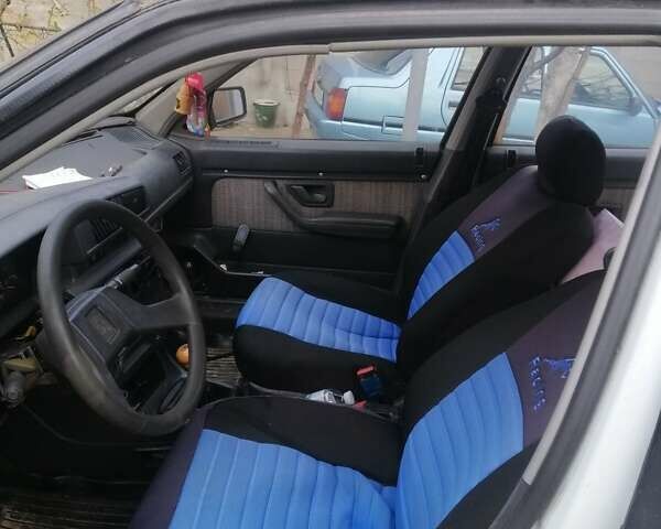 Белый Пежо 405, объемом двигателя 1.6 л и пробегом 217 тыс. км за 600 $, фото 6 на Automoto.ua