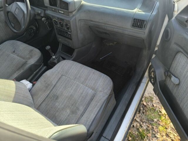 Белый Пежо 405, объемом двигателя 1.9 л и пробегом 293 тыс. км за 1350 $, фото 16 на Automoto.ua