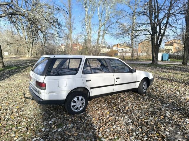Белый Пежо 405, объемом двигателя 1.9 л и пробегом 293 тыс. км за 1350 $, фото 2 на Automoto.ua