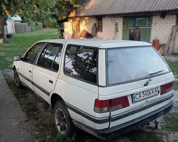 Белый Пежо 405, объемом двигателя 1.9 л и пробегом 200 тыс. км за 1800 $, фото 8 на Automoto.ua