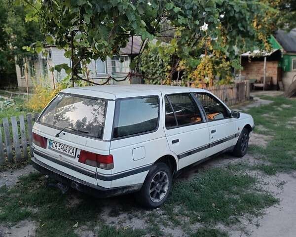 Белый Пежо 405, объемом двигателя 1.9 л и пробегом 200 тыс. км за 1800 $, фото 6 на Automoto.ua