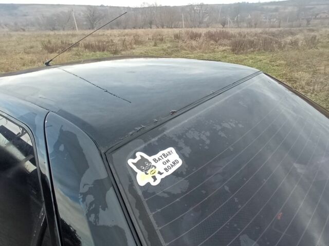 Черный Пежо 405, объемом двигателя 1.9 л и пробегом 270 тыс. км за 700 $, фото 4 на Automoto.ua