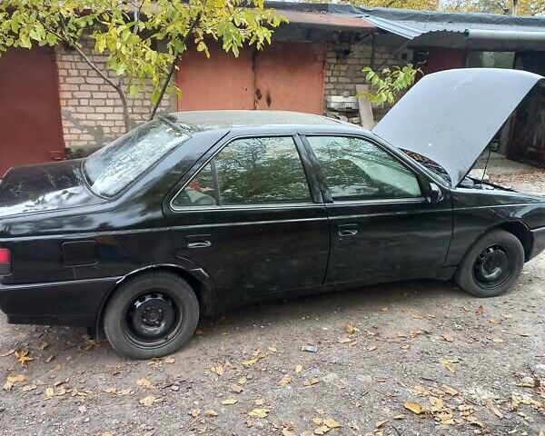 Черный Пежо 405, объемом двигателя 1.7 л и пробегом 111 тыс. км за 1500 $, фото 3 на Automoto.ua