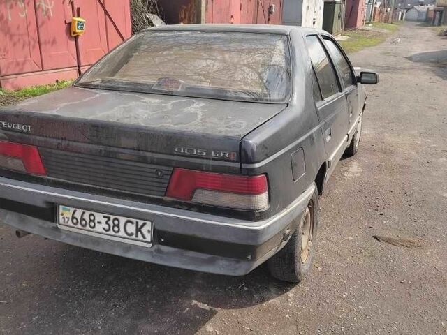 Черный Пежо 405, объемом двигателя 1.6 л и пробегом 280 тыс. км за 600 $, фото 2 на Automoto.ua