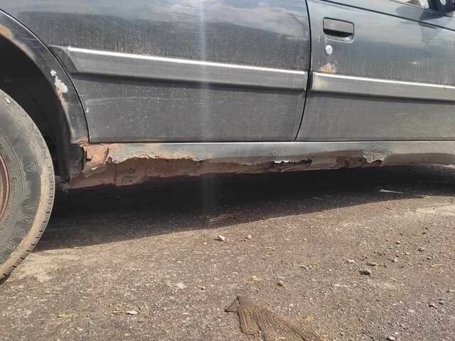 Черный Пежо 405, объемом двигателя 1.6 л и пробегом 280 тыс. км за 600 $, фото 7 на Automoto.ua