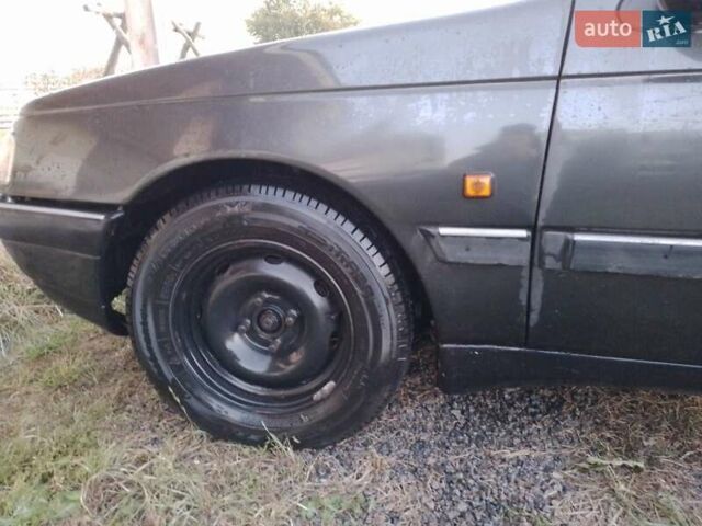 Черный Пежо 405, объемом двигателя 1.9 л и пробегом 555 тыс. км за 1999 $, фото 1 на Automoto.ua
