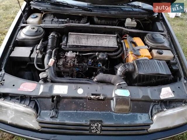 Черный Пежо 405, объемом двигателя 1.9 л и пробегом 555 тыс. км за 1999 $, фото 4 на Automoto.ua