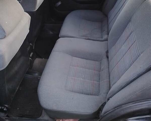 Черный Пежо 405, объемом двигателя 1.9 л и пробегом 555 тыс. км за 1999 $, фото 2 на Automoto.ua