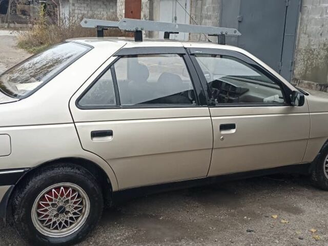 Коричневый Пежо 405, объемом двигателя 1.9 л и пробегом 220 тыс. км за 2500 $, фото 4 на Automoto.ua