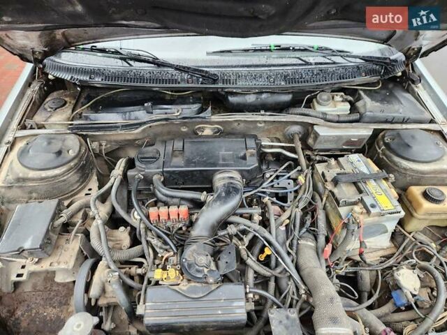 Серый Пежо 405, объемом двигателя 1.99 л и пробегом 355 тыс. км за 870 $, фото 13 на Automoto.ua