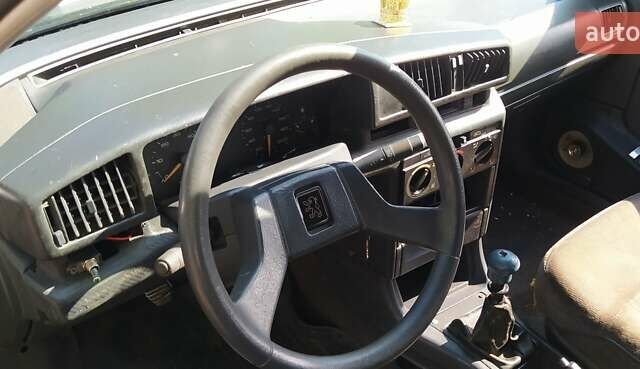 Серый Пежо 405, объемом двигателя 1.9 л и пробегом 220 тыс. км за 475 $, фото 19 на Automoto.ua