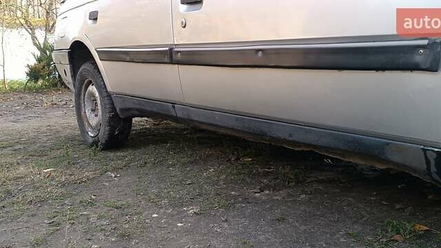 Серый Пежо 405, объемом двигателя 1.9 л и пробегом 220 тыс. км за 462 $, фото 12 на Automoto.ua