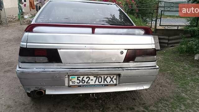 Серый Пежо 405, объемом двигателя 1.9 л и пробегом 220 тыс. км за 486 $, фото 5 на Automoto.ua