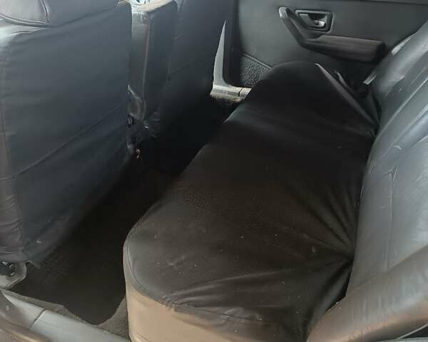 Серый Пежо 405, объемом двигателя 1.9 л и пробегом 250 тыс. км за 750 $, фото 12 на Automoto.ua