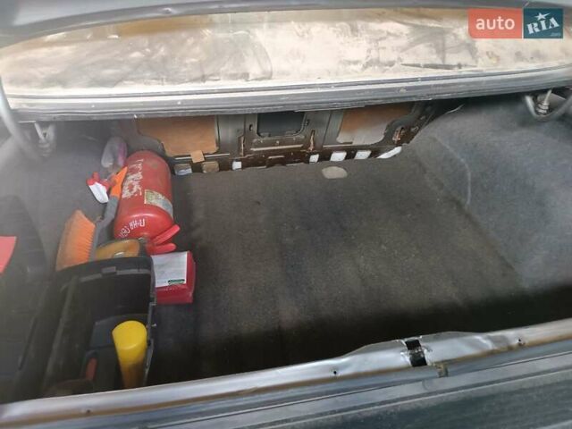 Серый Пежо 405, объемом двигателя 1.9 л и пробегом 250 тыс. км за 750 $, фото 9 на Automoto.ua