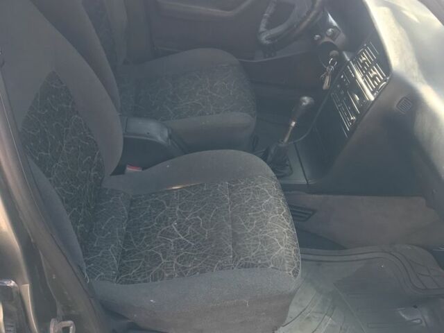 Серый Пежо 405, объемом двигателя 1.9 л и пробегом 324 тыс. км за 714 $, фото 11 на Automoto.ua