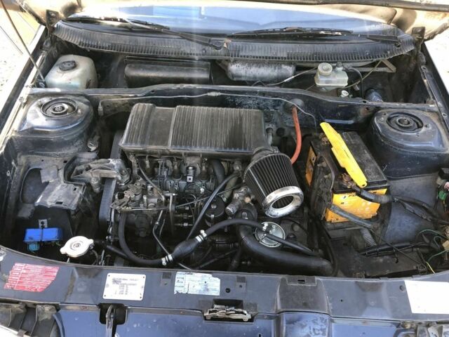 Синий Пежо 405, объемом двигателя 1 л и пробегом 1000 тыс. км за 451 $, фото 6 на Automoto.ua