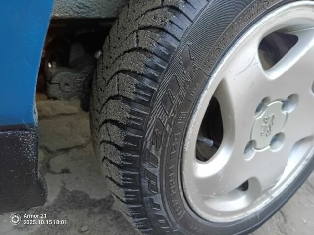 Синий Пежо 405, объемом двигателя 1.9 л и пробегом 400 тыс. км за 1200 $, фото 3 на Automoto.ua