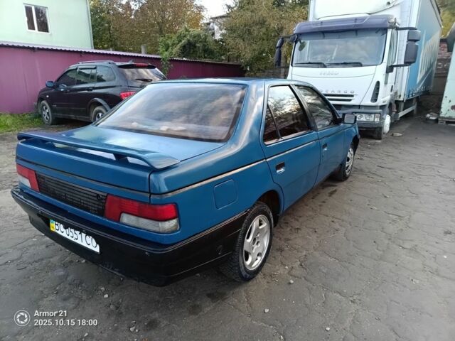 Синий Пежо 405, объемом двигателя 1.9 л и пробегом 400 тыс. км за 1200 $, фото 1 на Automoto.ua