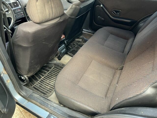 Синий Пежо 405, объемом двигателя 1.9 л и пробегом 300 тыс. км за 1400 $, фото 7 на Automoto.ua
