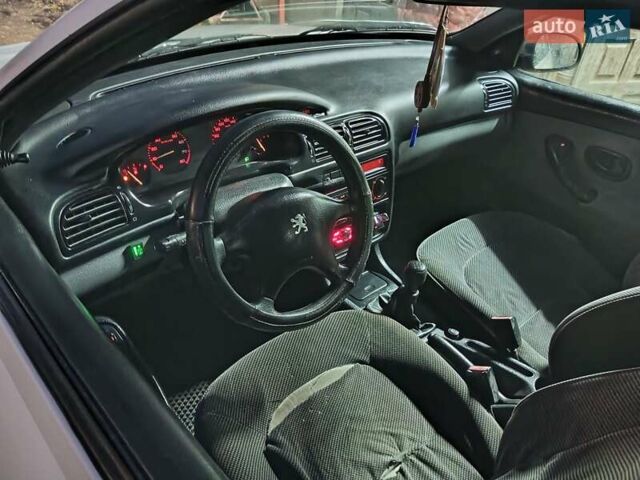 Белый Пежо 406, объемом двигателя 1.76 л и пробегом 200 тыс. км за 1850 $, фото 23 на Automoto.ua