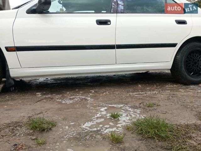 Белый Пежо 406, объемом двигателя 1.76 л и пробегом 200 тыс. км за 1850 $, фото 9 на Automoto.ua